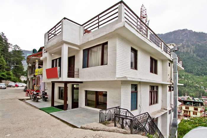 Best view of Hotel Meadows manali image	3 hotel room, amenities, and facilities