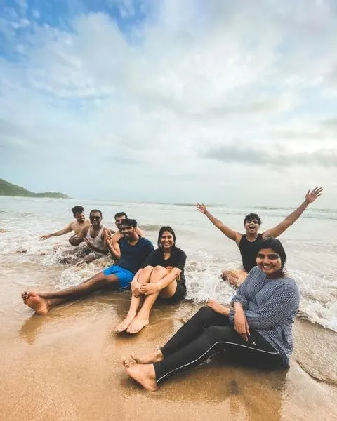 Friends enjoying a fun-filled beach holiday in Goa